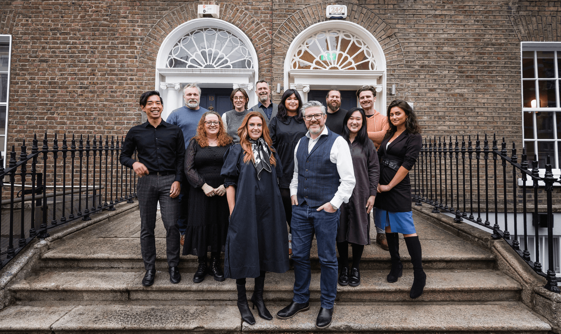 Agency X team standing outside 12 Hatch Street